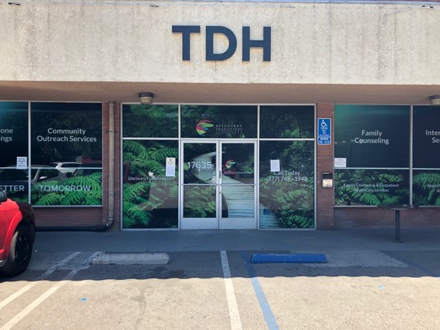 The front entrance of Discovery Transitions IOP, characterized by its signage offering hope and support, indicative of a Dual Diagnosis Rehab facility in Los Angeles.