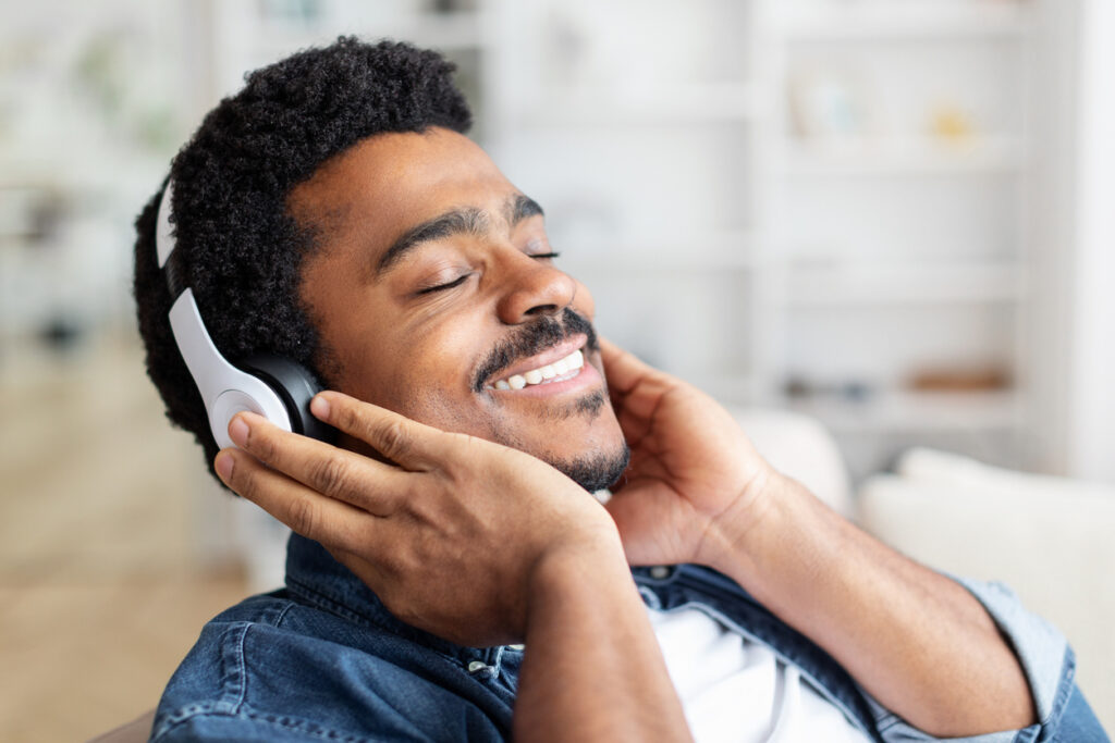 A man using music therapy to create a mindfulness state for himself