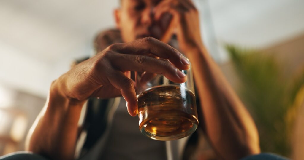 alcoholic,,stress,and,glass,of,whiskey,with,person,in,living